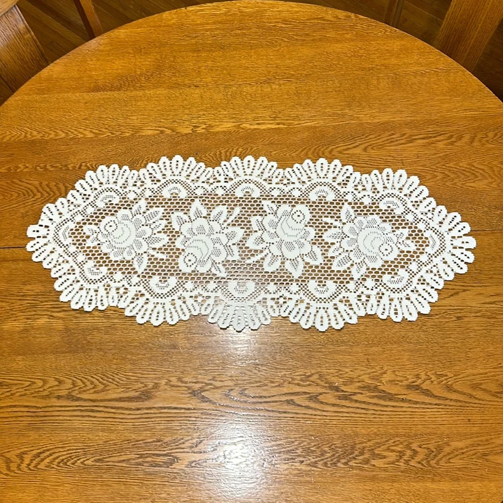 #1 33”x 14” Floral doliy with scalloped edges color is crème color